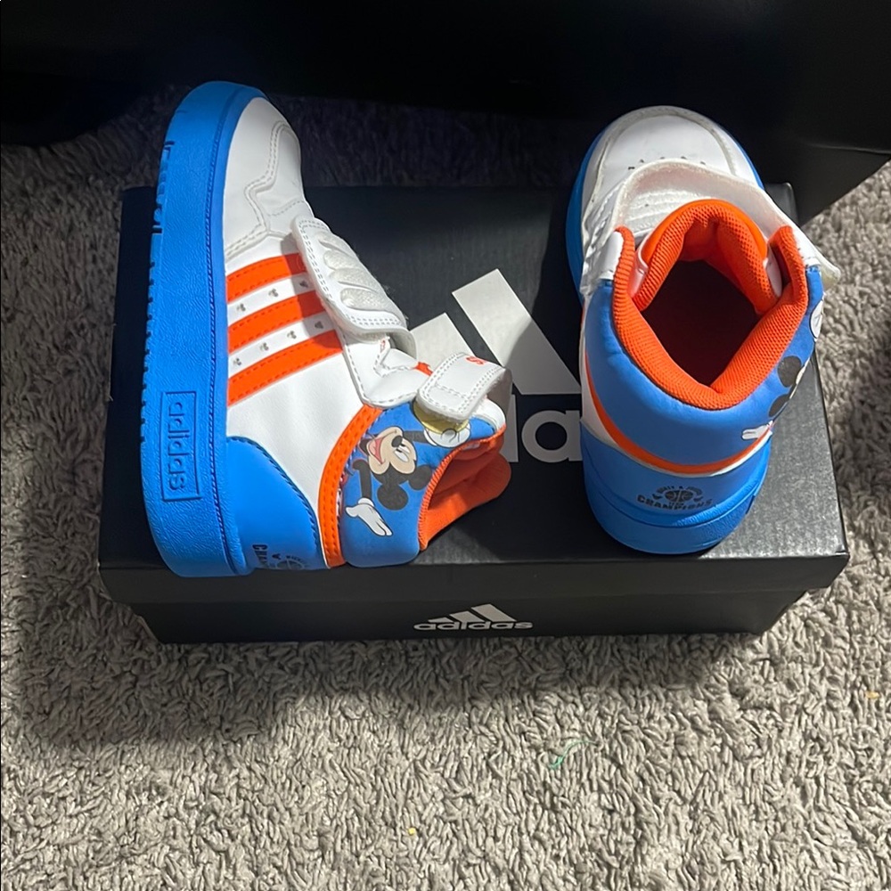 adidas White and Blue Sneakers with Bold Design and Iconic Stripes